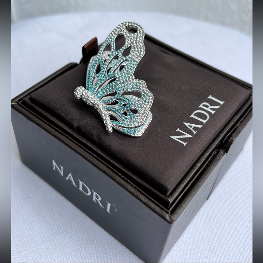 Nadri butterfly brooch w/light blue crystals in silver tone setting New with box